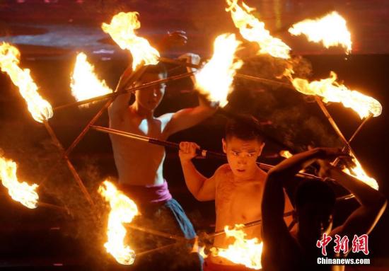 图为7月底，火舞团在新竹参演器乐剧《十面埋伏》。 中华经济报记者 张宇 摄